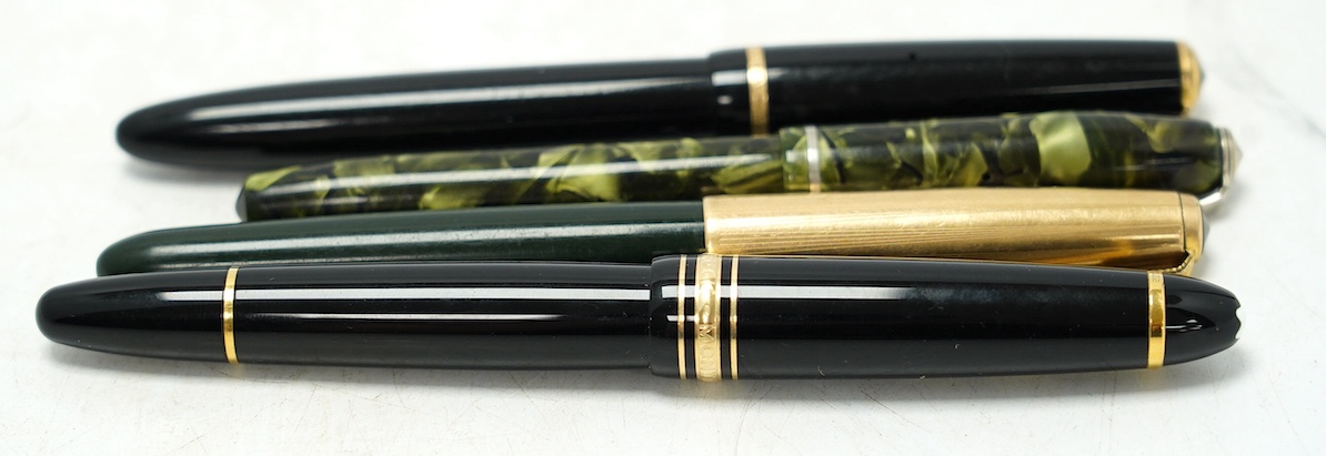 A Montblanc fountain pen with 14k gold nib and three others comprising two Parker’s and a marbleised example